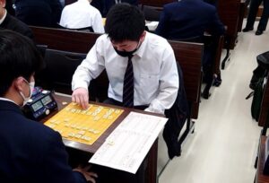 卒業後、高校生活最後の対局へ